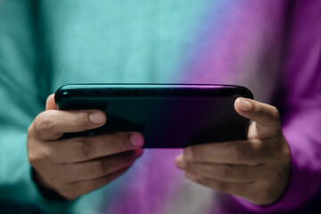 Closeup of Person Using Mobile Phone. Lifestyle of Modern People. Front View. Selective Focus on Smartphone