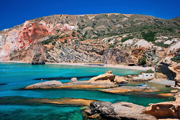 MILOS ISLAND, CYCLADES, AEGEAN SEA, GREECE. View of colorful Fyriplaka beach. 