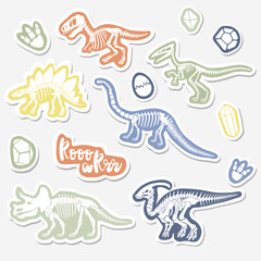 Vector sticker set with dinosaur skeleton isolated on a white background.