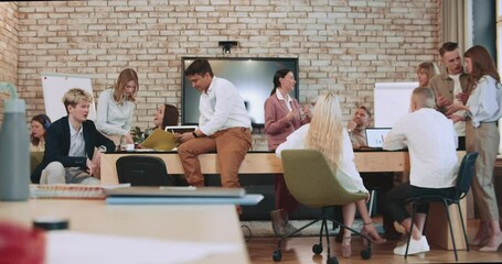 Group of creative young diverse business people, startup partners brainstorm, work together at office hub slow motion.