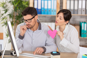 couple of colleagues discussing work project