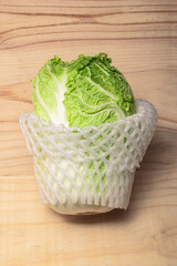 Vegetable food cabbage chinese on wood table.