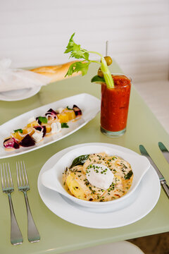 French Brunch of Tartiflette, beetroot salad and Bloody Mary.