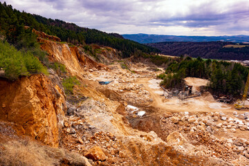 Quarry with travertine, stone and gravel mining on travertine mountain in Slovakia with its processing and preparation for sale