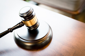 Judge's gavel on the wood table, Law concept.