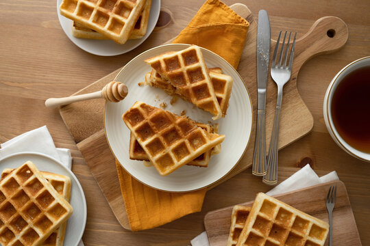 Delicious waffles served on ceramic plate