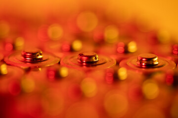 Closeup of positive ends of discharged batteries AA sizes, macro shot, selective focus. Used...
