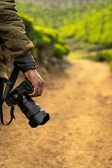 Travel Photographer with his camera,world Photography day concept image, composition, young photographer, outdoor, 