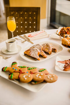 Holiday brunch with gingerbread men and French toast.