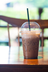 Iced coffee in a plastic cup.