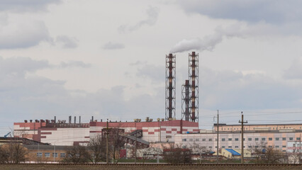 Fototapeta premium Koper for raising ore. Mine buildings. Technology to extract the mineral from underground. Mining. Potassium salt.