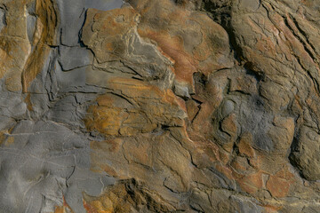 Obraz na płótnie Canvas Mountain stone surface. Geological rock wall texture