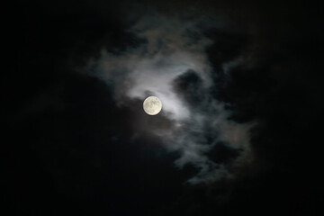 Naklejka na ściany i meble Beautiful cloudy full moon