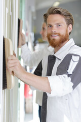 young man doing home renovation