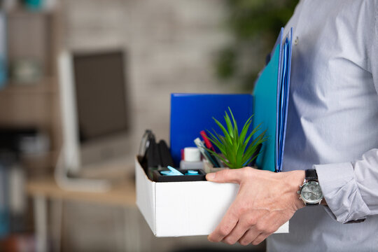 close up of hand holiding a box