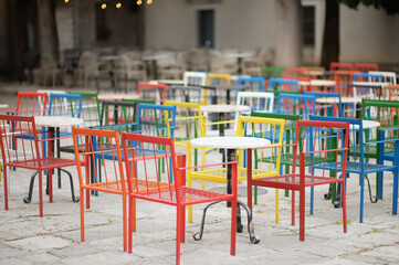 Fototapeta na wymiar Empty stylish street cafe in Europe