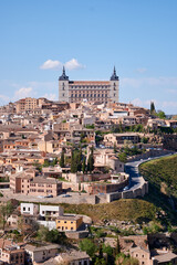 Fototapeta na wymiar View of part of the city of Toledo with the Alcazar at the top