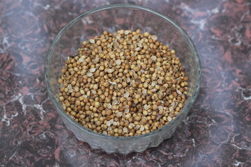 Coriander seeds decorated in a glass bowl