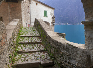 Medieval stone bridge over Como lake.Nesso, Italy