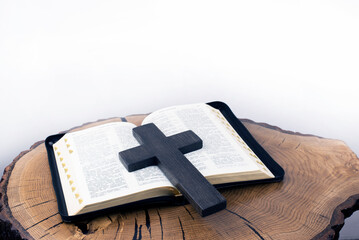 Holy Bible. Cross of Jesus, crucifixion. Our Easter is Christ. Open bible on the table. Prayer....