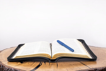 Bible. Open bible on the table. Holy. Book on a wooden background. Scripture, Gospel.