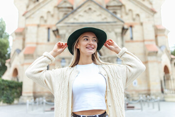 Fototapeta premium Young fashion woman spends time in the city. Lifestyle