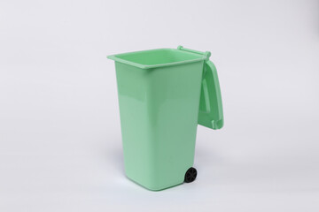 Plastic trash can isolated on white background