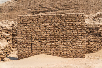 A wall made of mud bricks in the ruins of the Moche cultural palace