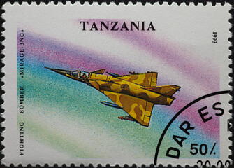TANZANIA - CIRCA 1993: a postage stamp from TANZANIA, showing a military aircraft fighting bomber...