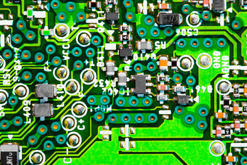 Close up of components and microchips on PC circuit board.