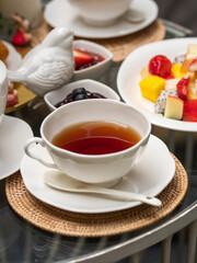 Obraz na płótnie Canvas Afternoon tea. A cup of tea on the table.