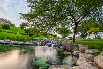 Fototapeta na wymiar Beautiful and green park in Katara Cultural Village, Katara Lake Hill