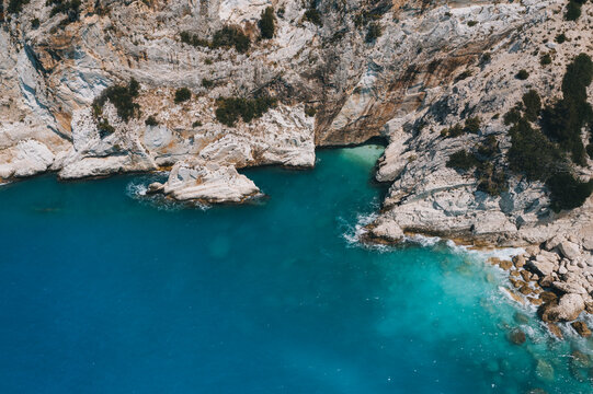 Famous Myrtos azure water beach against limestone cliffs, Kefalonia