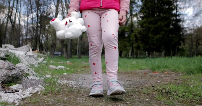 No war in Ukraine. girl near a destroyed house in Ukraine.