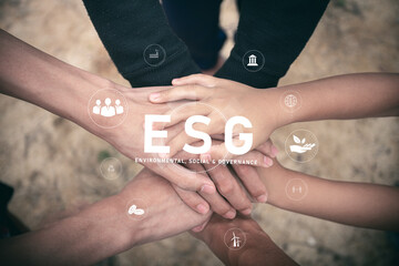Hands teamwork harmony holding hands with ESG icon concept for environmental, social, and...