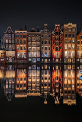 Fototapeta na wymiar Canal houses of Damrak, Amsterdam