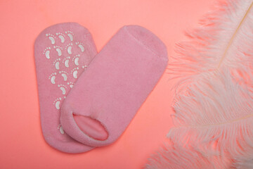 female booty gel socks and gloves isolated on a white background. body care, cosmetology.