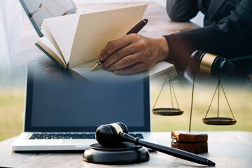 Judge gavel and legal book on wooden table, justice and law concept