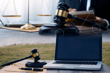 Judge gavel and legal book on wooden table, justice and law concept