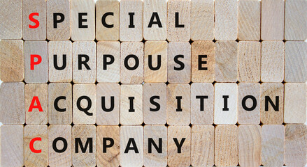 SPAC special purpose acquisition company symbol. Concept words SPAC special purpose acquisition company on beautiful wooden background. Business SPAC special purpose acquisition company concept.