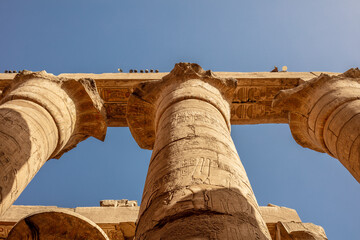 Different columns with hieroglyphs in Karnak temple. Karnak temple is the largest complex in...