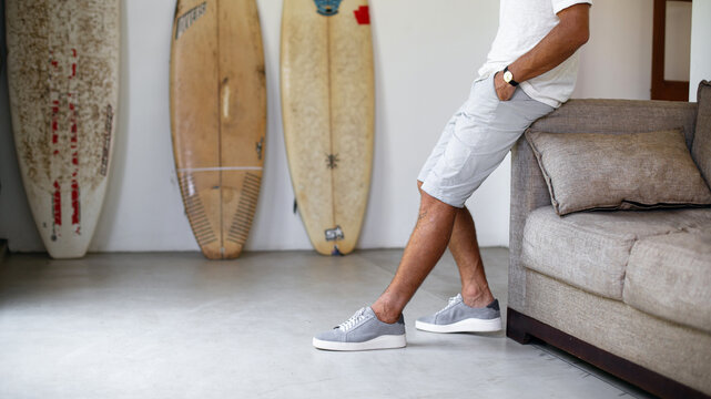 Light grey men's shorts, men's fashion, fashion closeup photo for banner, summer season. - Powered by Adobe