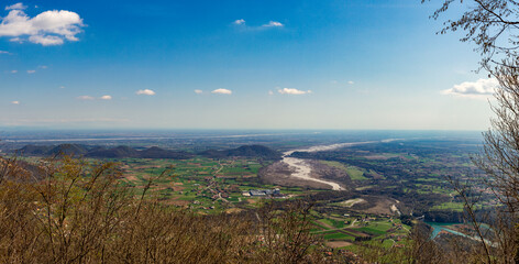 panoramic view with river and blue sky, Italy