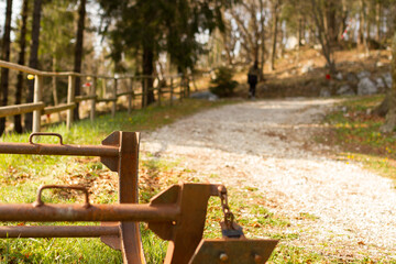 rusty metal structure with mountain road in the background