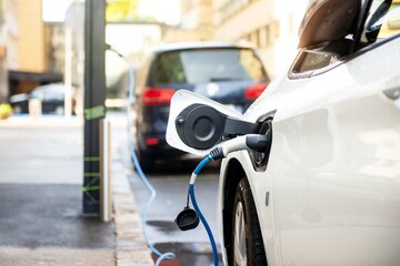 Fototapeta Electric car charging. E-mobility. obraz