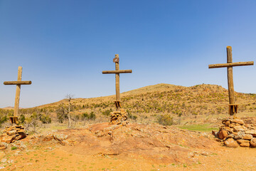 Sunny view of wooden cross in The Holy City of the Wichitas