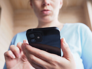 Belarus,Minsk,2022.female hands use iPhone 12