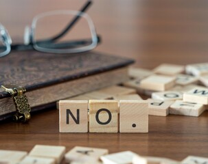 no. word or concept represented by wooden letter tiles on a wooden table with glasses and a book - obrazy, fototapety, plakaty