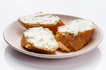 baguette cream cheese sandwich on a white background