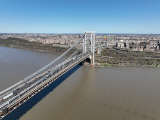 Aerial view of George Washington Bridge in Fort Lee, NJ. George Washington Bridge is a suspension bridge spanning the Hudson River connecting NJ to Manhattan.